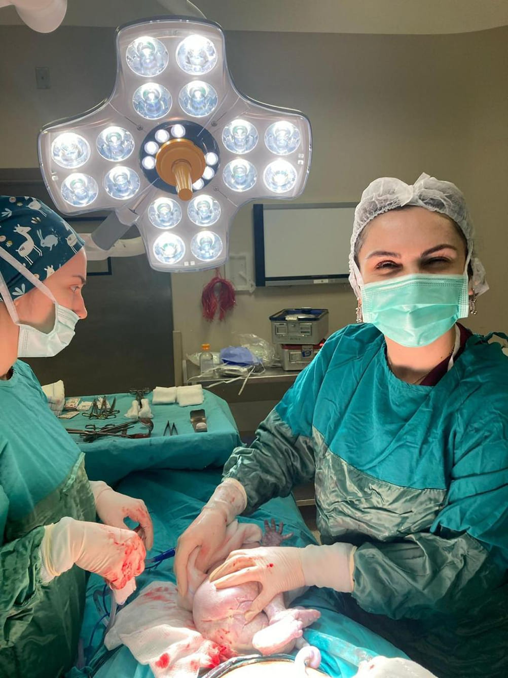 Gynecologist performing minimally invasive surgery